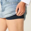 Mini-saia-calça jeans clara com tachas Mini-saia-calça jeans clara com tachas
