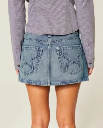 Mini-saia-calça jeans com bolso bordado em forma de estrela