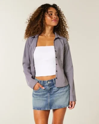 Mini-saia-calça jeans com bolso bordado em forma de estrela