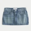 Mini-saia-calça jeans com bolso bordado em forma de estrela Mini-saia-calça jeans com bolso bordado em forma de estrela