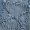 Mini-saia-calça jeans com bolso bordado em forma de estrela Mini-saia-calça jeans com bolso bordado em forma de estrela