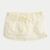 Mini-saia-calça micro em sarja com cintura ultra baixa