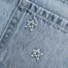 Mini-saia-calção de ganga com bordado de estrelas e cintura baixa