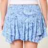 Mini-saia com bainha assimétrica em camadas Mini-saia com bainha assimétrica em camadas