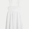 Mini vestido babydoll com alças atadas