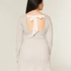 Mini vestido babydoll com laço nas costas