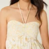 Mini vestido babydoll sem alças com folhos