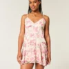 Mini vestido com bainha assimétrica