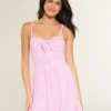 Mini vestido de malha com laço à frente