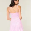 Mini vestido de malha com laço à frente