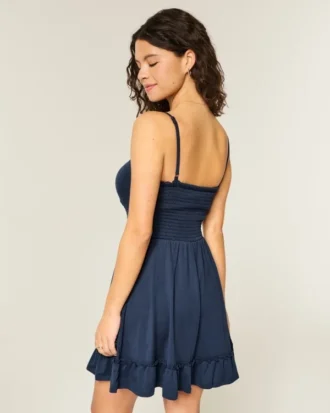 Mini vestido de malha com laço à frente