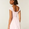 Mini vestido de manga curta com botões