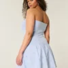Mini vestido sem alças com cintura descida em malha