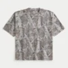 T-shirt curta e larga com estampa camuflada