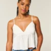 Top babydoll brilhante com bordado simples Top babydoll brilhante com bordado simples