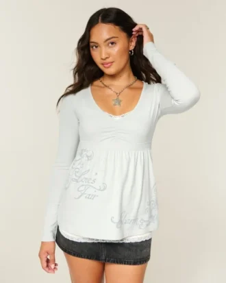 Top babydoll com mangas compridas e estampado