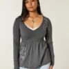 Top babydoll com mangas compridas e estampado Top babydoll com mangas compridas e estampado