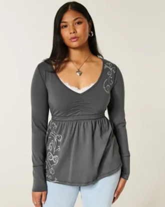 Top babydoll com mangas compridas e estampado