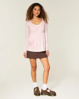 Top babydoll com mangas compridas e estampado