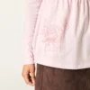 Top babydoll com mangas compridas e estampado