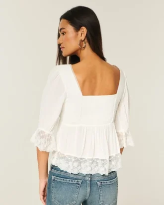 Top babydoll com mangas três quartos