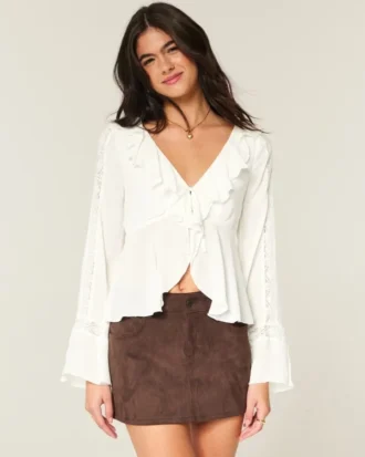 Top babydoll de manga comprida com folhos