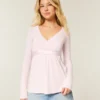 Top babydoll de manga comprida com frente cruzada