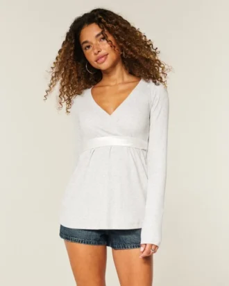 Top babydoll de manga comprida com frente cruzada