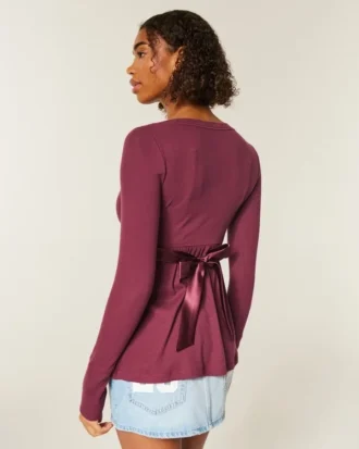 Top babydoll de manga comprida com frente cruzada