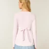 Top babydoll de manga comprida com frente cruzada