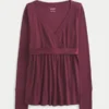 Top babydoll de manga comprida com frente cruzada