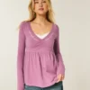 Top babydoll de manga comprida com pinças no peito