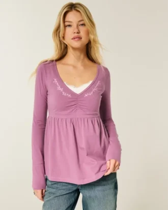 Top babydoll de manga comprida com pinças no peito