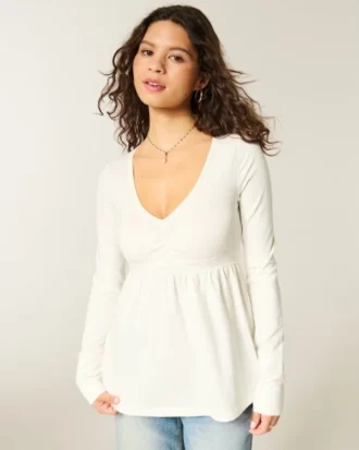 Top babydoll de manga comprida com pinças no peito