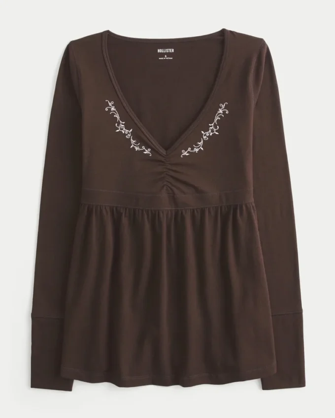 Top babydoll de manga comprida com pinças no peito