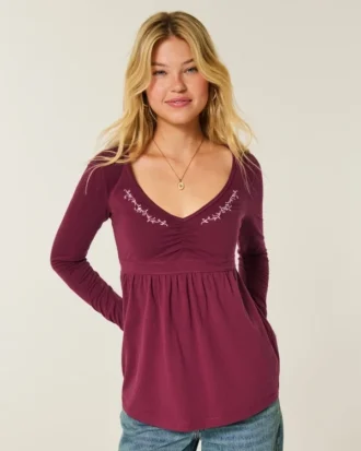 Top babydoll de manga comprida com pinças no peito