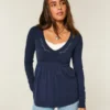 Top babydoll de manga comprida com pinças no peito