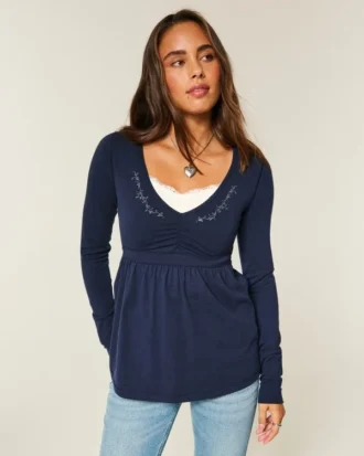 Top babydoll de manga comprida com pinças no peito