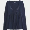 Top babydoll de manga comprida com pinças no peito