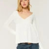 Top babydoll de manga comprida com ponto aberto Top babydoll de manga comprida com ponto aberto