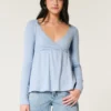 Top babydoll de manga comprida com ponto aberto Top babydoll de manga comprida com ponto aberto