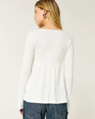 Top babydoll de manga comprida com ponto aberto