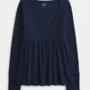 Top babydoll de manga comprida com ponto aberto Top babydoll de manga comprida com ponto aberto