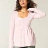 Top babydoll Henley de manga comprida