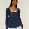 Top babydoll Henley de manga comprida