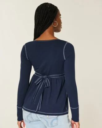 Top babydoll Henley de manga comprida