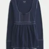 Top babydoll Henley de manga comprida