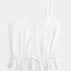 Top com peplum e detalhes em renda