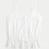 Top com peplum e detalhes em renda