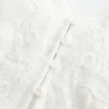 Top longo com detalhes em renda